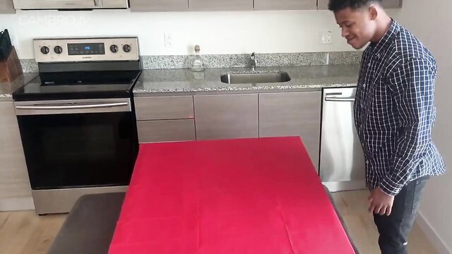 Black guy in kitchen with red sheet setup in stepmom birthday surprise porn thumbnail