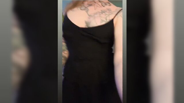 Tattooed redhead TS Diana Deelight in tight black dress solo tease