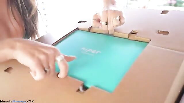 Brunette unboxing green sex toy robot pool cleaner