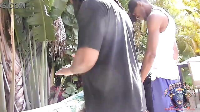 Roc Bundy and black friends outdoors with mature slut