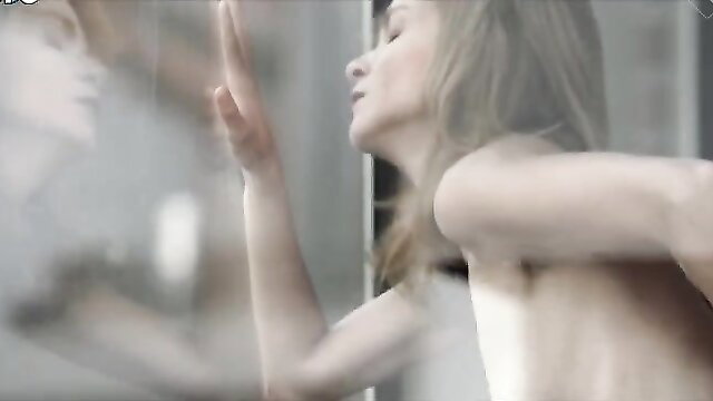 Hannelore Knuts nude sideboob and armpit pose in The Invader (2011)