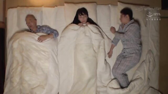 Japanese JAV threesome thumbnail with mature man, black-haired woman, young man in bed