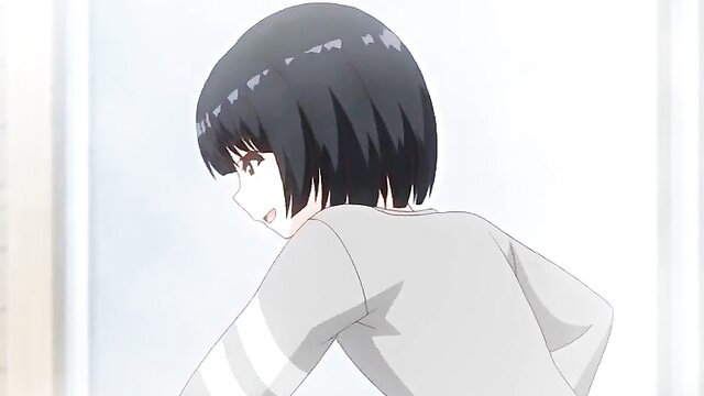 Asian bob-cut girl smiling back in gray tracksuit at steamy onsen