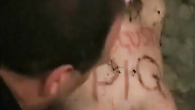 Woman marked as pig in extreme pain BDSM scene from The Pain Files