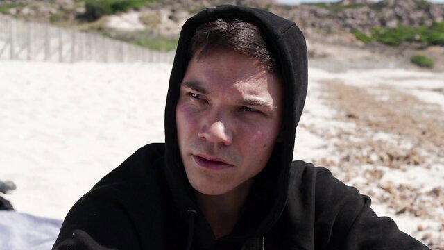 Maya Coline hooded on beach in Jessica Forever nude scene