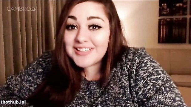 Cute busty Latina Destiny Diaz smiles in cozy sweater storytime