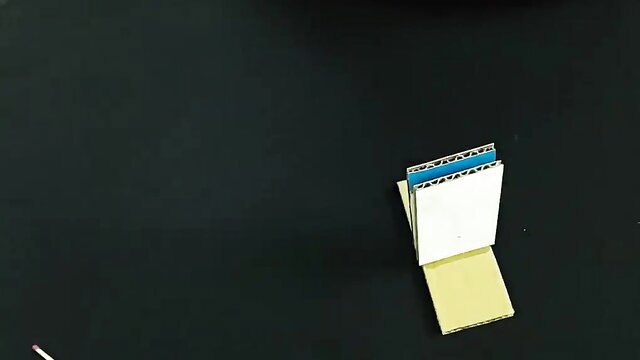 Magic tricks at home porn video HD thumbnail with stacked colored cardboards
