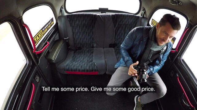 Andy Stone in sexy London cab, ready for naughty photos