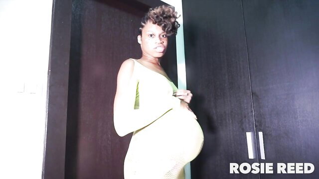 Rosie Reed oiled black pregnant belly in sheer dress solo