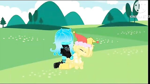 Blue ghost girl with jester hat cuddles yellow slime pony in grassy field