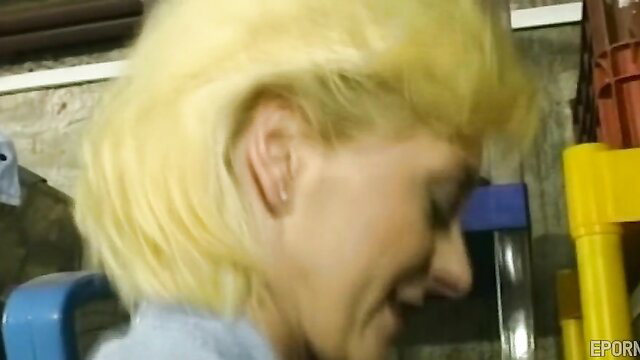 Blondie MILF coquette smiling in garage, teasing xxx preview