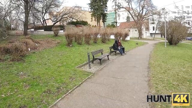 Lilly Mays and Charlie Dean cozy on park bench next door action