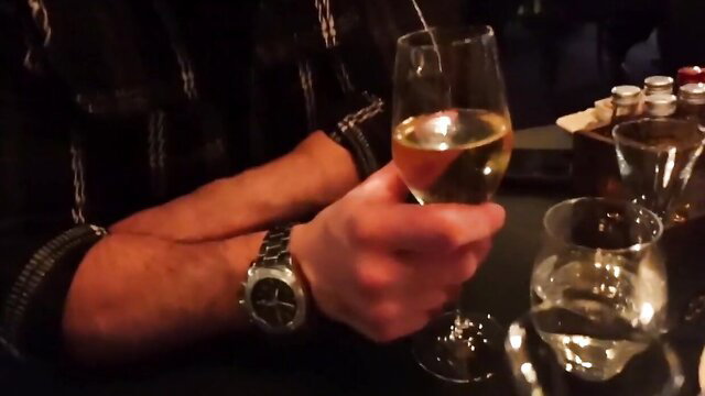 Man holding wine glass in dark bar, POV tease with Amanda Breden