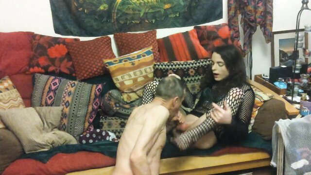 UK crossdresser in fishnets footjobs hung grandad on couch