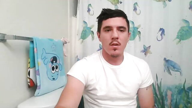 Gay redneck teen in white tee poses in bathroom, amateur thumbnail
