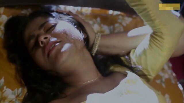 Indian wife in yellow saree lies seductively on bed in husband sells wife web series