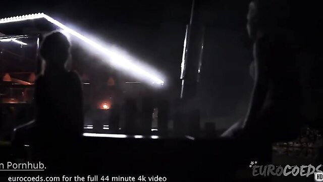 Silhouetted best friends in steamy private amateur sex scene on stage