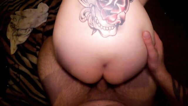 Amateur woman with skull rose back tattoo grabs big pale ass cheeks from POV