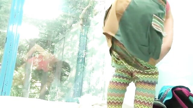Japanese teen GF in colorful pants bends over, cuckold watches through glass