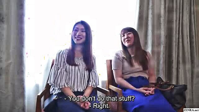 Two young Japanese mothers in CFNM chat, smiling casually