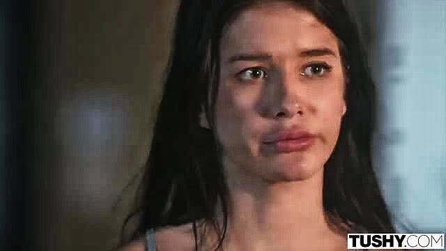 Sophie Weber teary-eyed closeup in Tushy scene