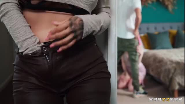 Tania in tight leather pants, tattoos, teasing stepmom look