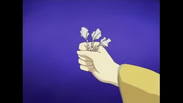 Anime hand gripping white feather-like flowers on purple background
