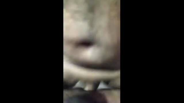 Close-up of King G's mouth and teeth in Straight Guy Fucking Gay Indian video