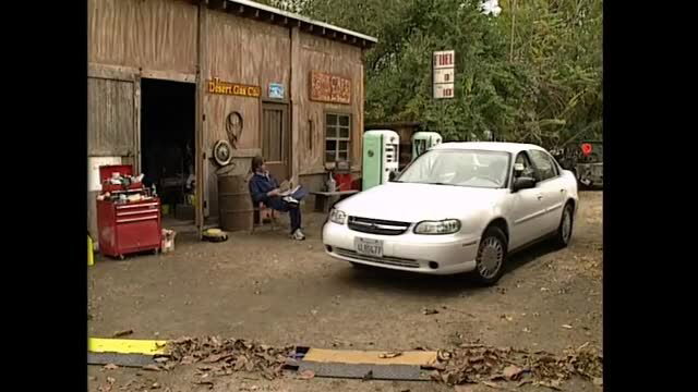 Blonde waits at garage with mechanic for adult scene