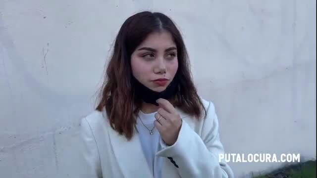 Latina in white coat giving street blowjob in public
