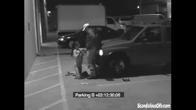 Slut blows security guard in parking lot to avoid fine