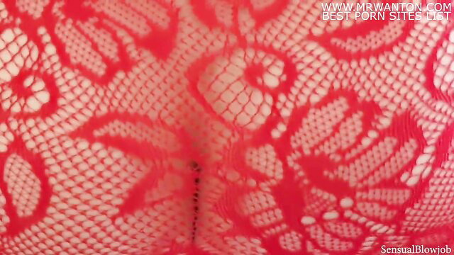 Closeup of woman's ass in red lace lingerie, teasing pussy view
