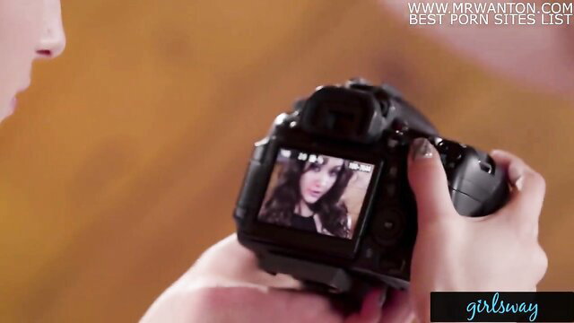 Aidra Fox on camera screen in GirlsWay photoshoot tease