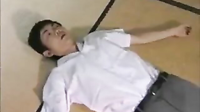 Young Japanese schoolboy lying dead on tatami floor in JAV aged video