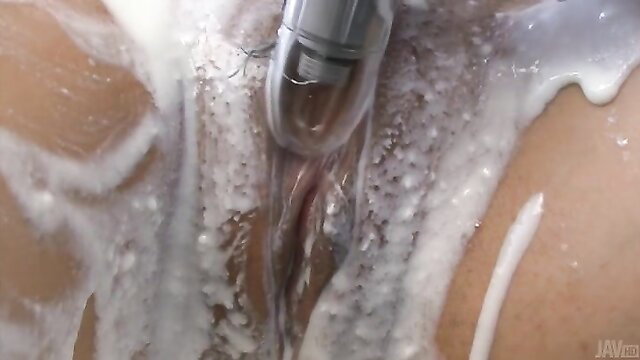 Asian beauty soapy pussy teased by vibrator in JAV closeup