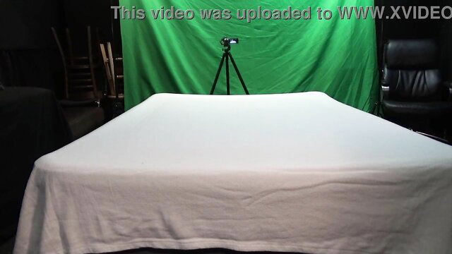 Angie Green in anal POV setup on white sheet bed