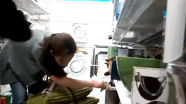 Amateur brunette in scrubs bends over in store, caught stealing Pt1