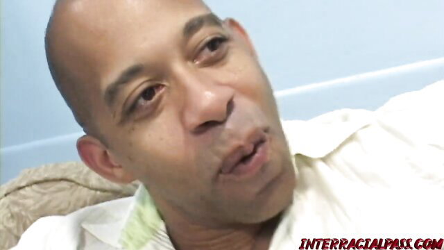 Bald black man smirking in Adriana BBC interracial scene