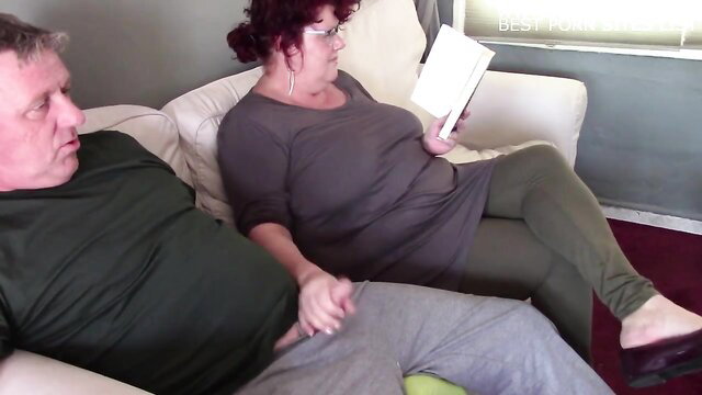 Redhead soccer mom handjob on couch during finals