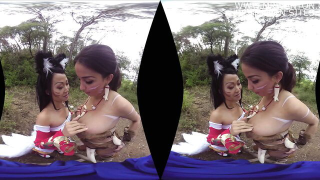 Two busty Asian cosplay babes in tribal lingerie fondling tits outdoors