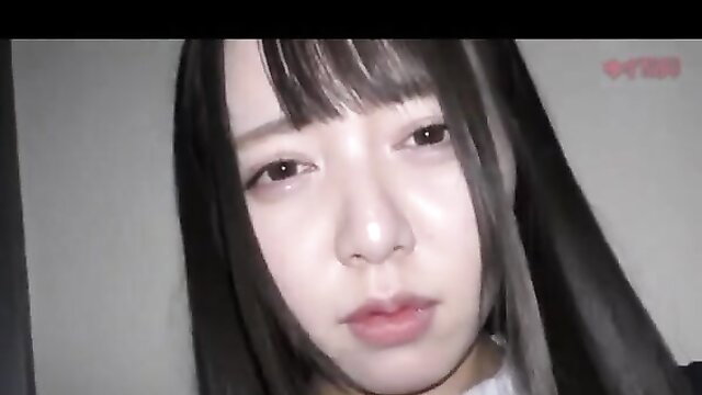 Asian JAV idol with bangs and straight black hair closeup portrait