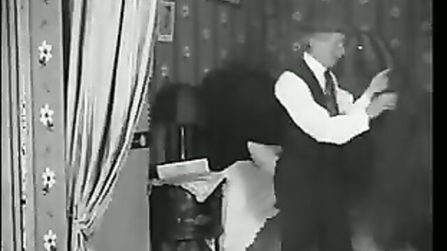 Vintage 1920s gay porn clip man in suit embracing nude lover