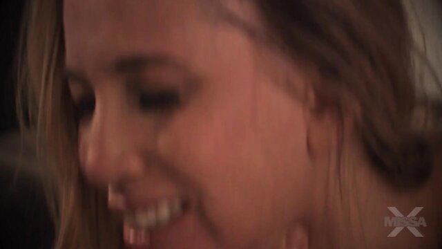 Smiling blonde MILF closeup from 'Mommy Has Her Special Place' adult video