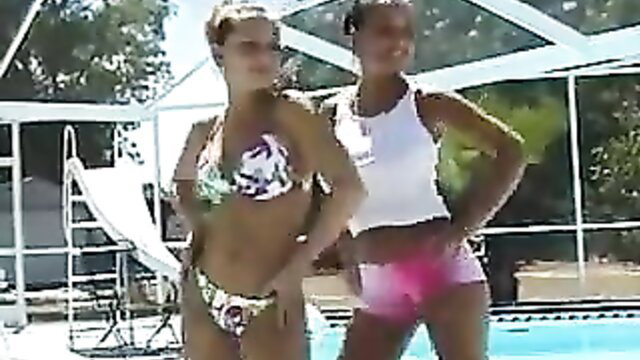 Astrid big boobs teen bouncing with friend at pool in bikinis
