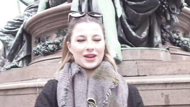 Blonde German hottie Mia Minou smiling in scarf at monument pickup