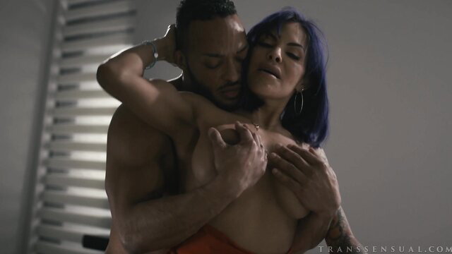 TS Foxxy purple hair Latina TS hugged by Dillon Diaz nude embrace