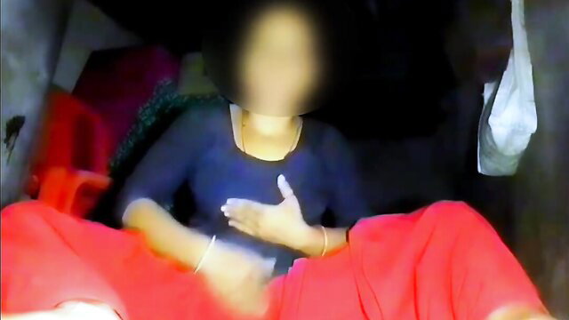 Indian beauty in blue top & red skirt sits spreading legs in homemade tease