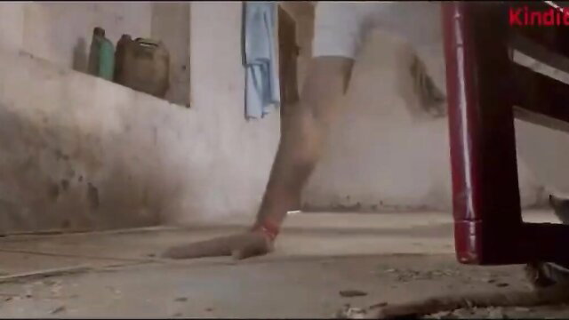 Indian wife in lingerie shows bare foot and leg to old man