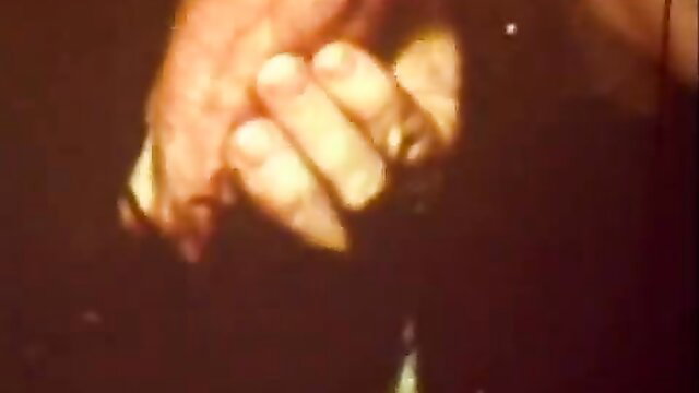 Closeup of hand gripping perky ass in hot vintage xxx movie