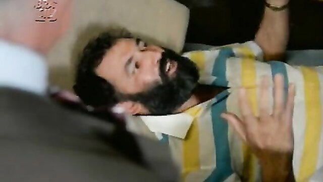 Bearded man in striped shirt grabbed by suited guy in classic Brazilian porn thumbnail